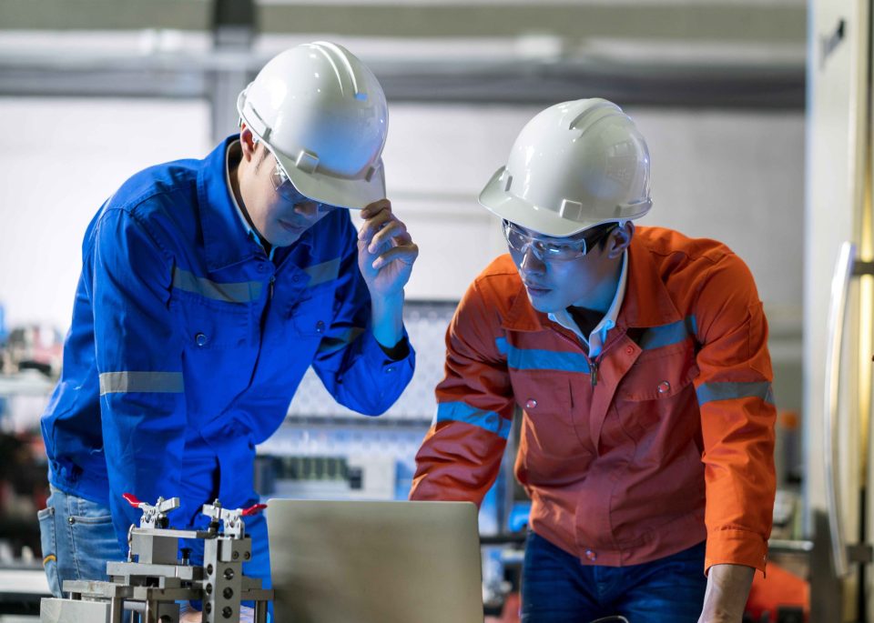 male-asian-engineer-professional-having-discussion-standing-concult-cnc-machine-factory-two-asian-coworker-brainstorm-explaining-solves-process-cnc-operate-machine